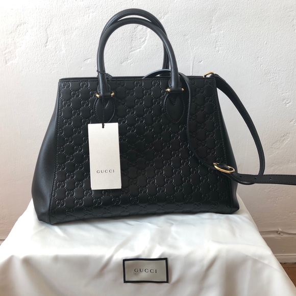 gucci signature leather top handle bag